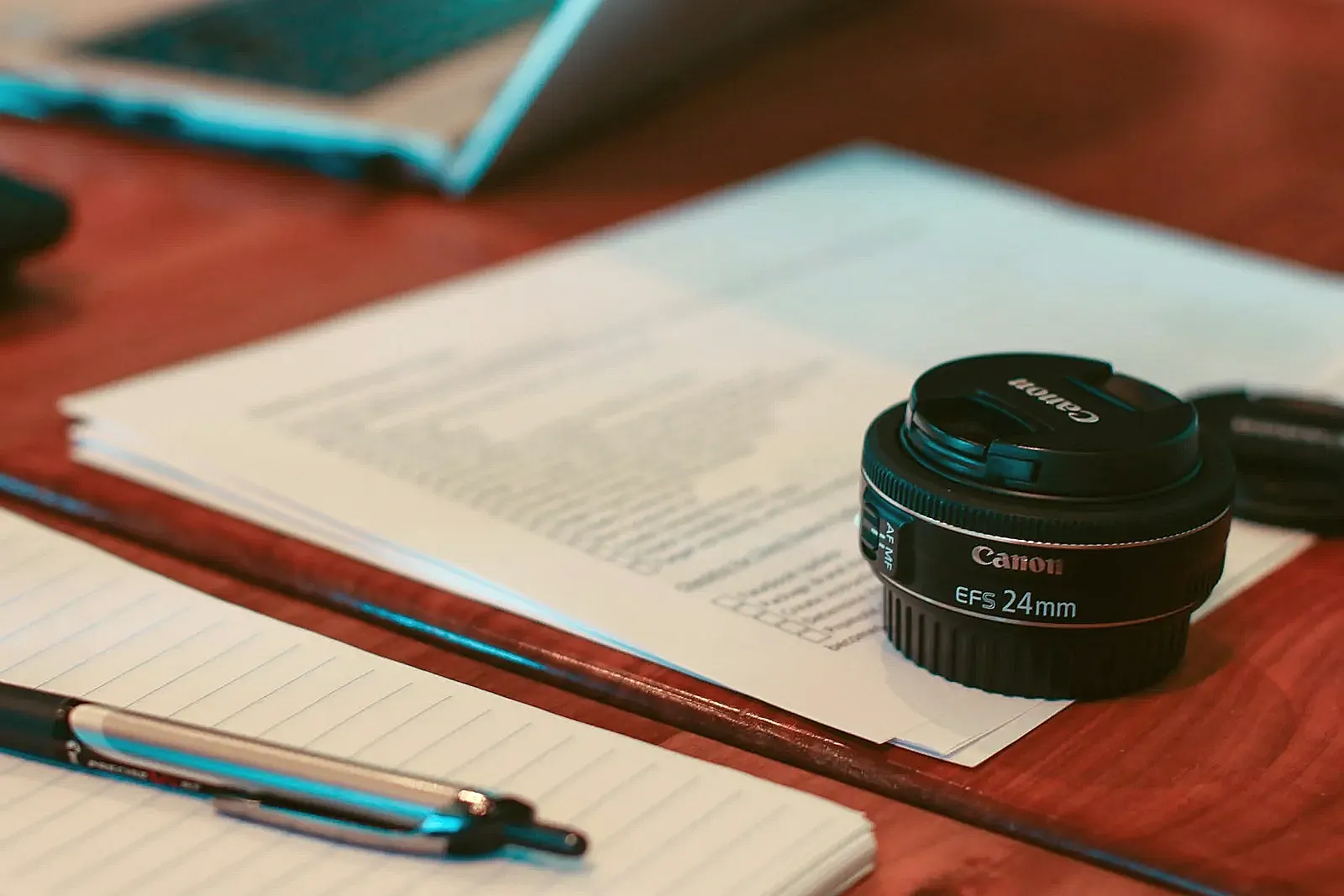 A resume formatting checklist beside a clean document draft and notes about spacing and headings.