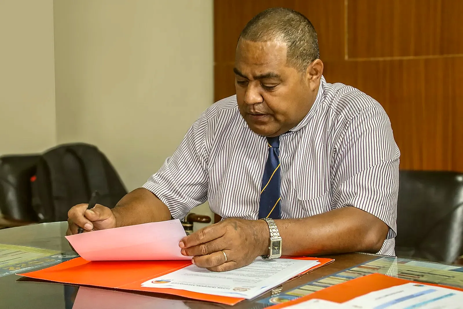 A professional settling into a new role after a career change.