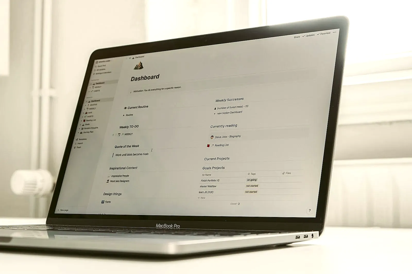 A laptop displaying a job search tracker dashboard with statuses and follow-up dates.