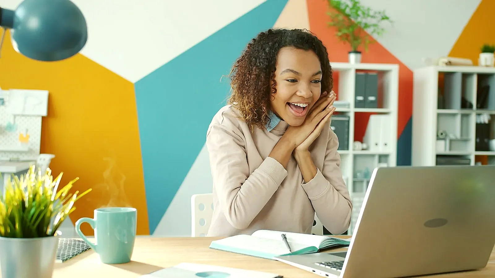 Job seeker editing their resume on a laptop at home.