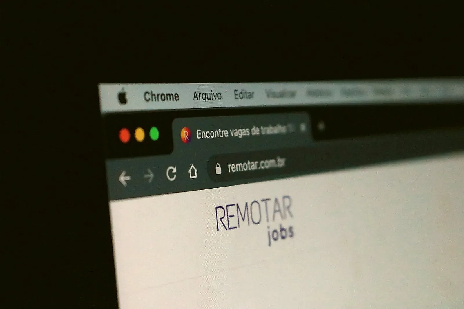 A resume bullet being edited on a laptop to sound natural while still matching key terms.