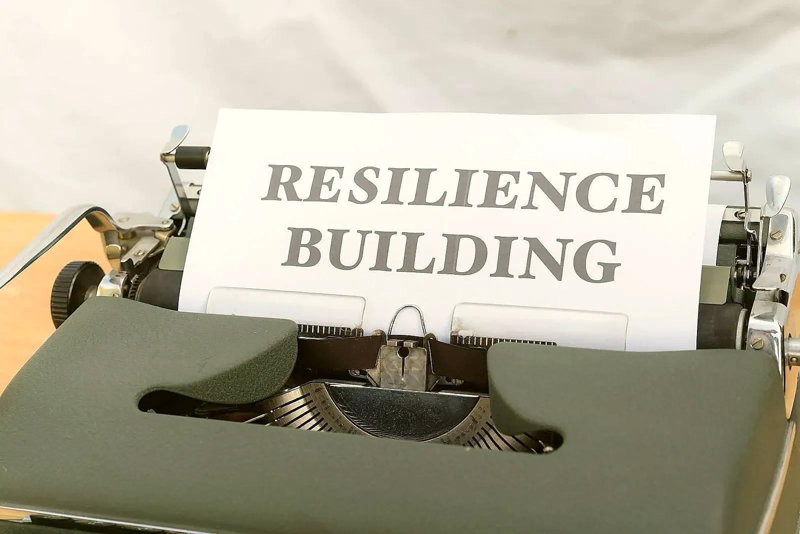 A professional rebuilding resume confidence with notes after a career break.