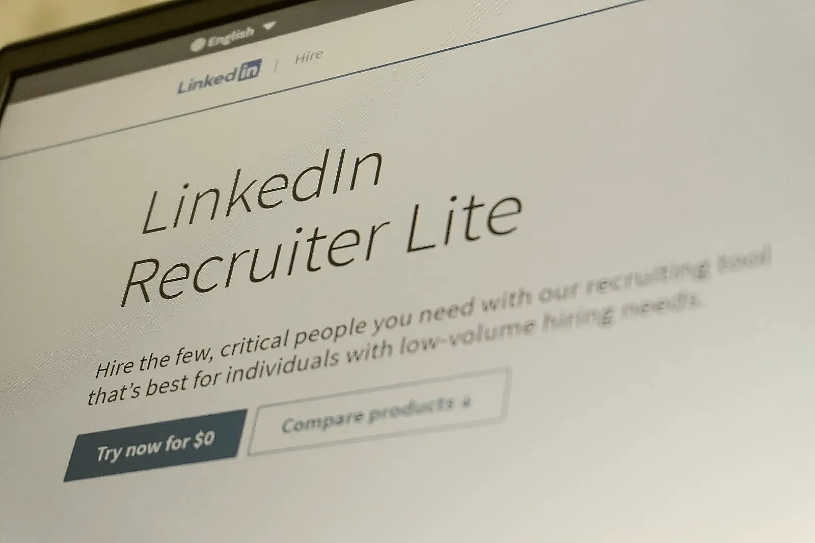 A recruiter using keyword search to filter candidates in an ATS platform.
