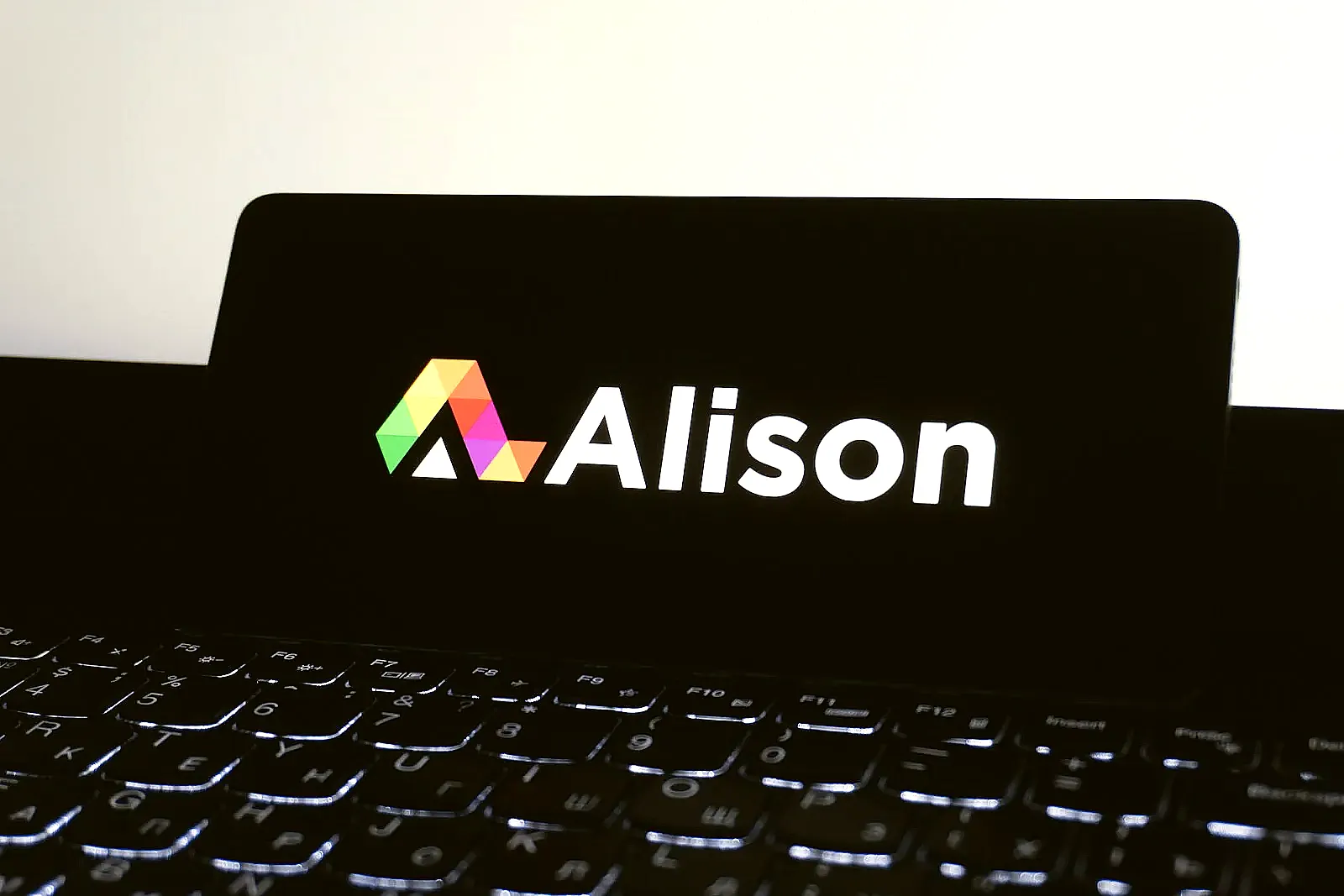 A person completing an online certification course on their laptop.